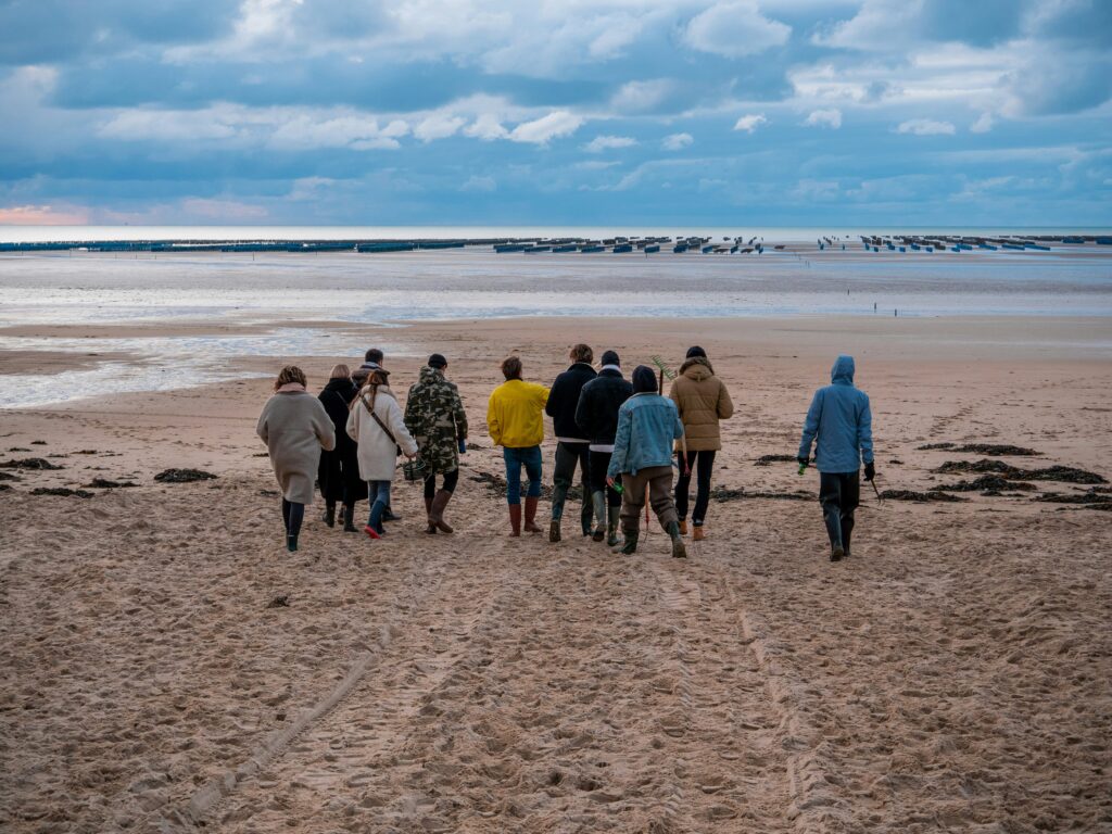 Group walking on a beach